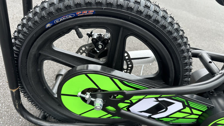 AB Bikes Kids Bikes 16 electric balance bike in green and black – rear wheel view