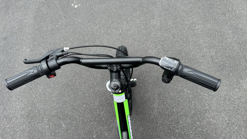 AB Bikes Kids Bikes 16 electric balance bike in green and black – handbar top view