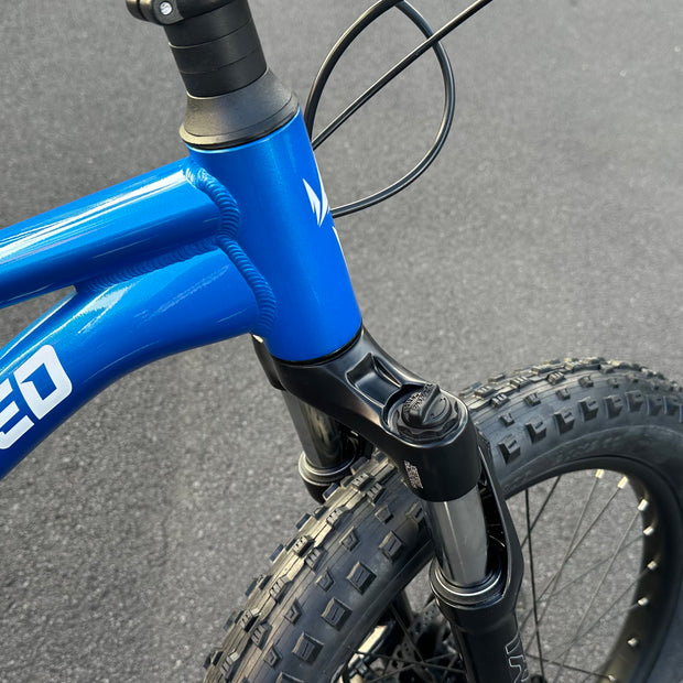 AB Bikes Kids Bikes 20inch Wrap Mountain bike in blue – head tube view