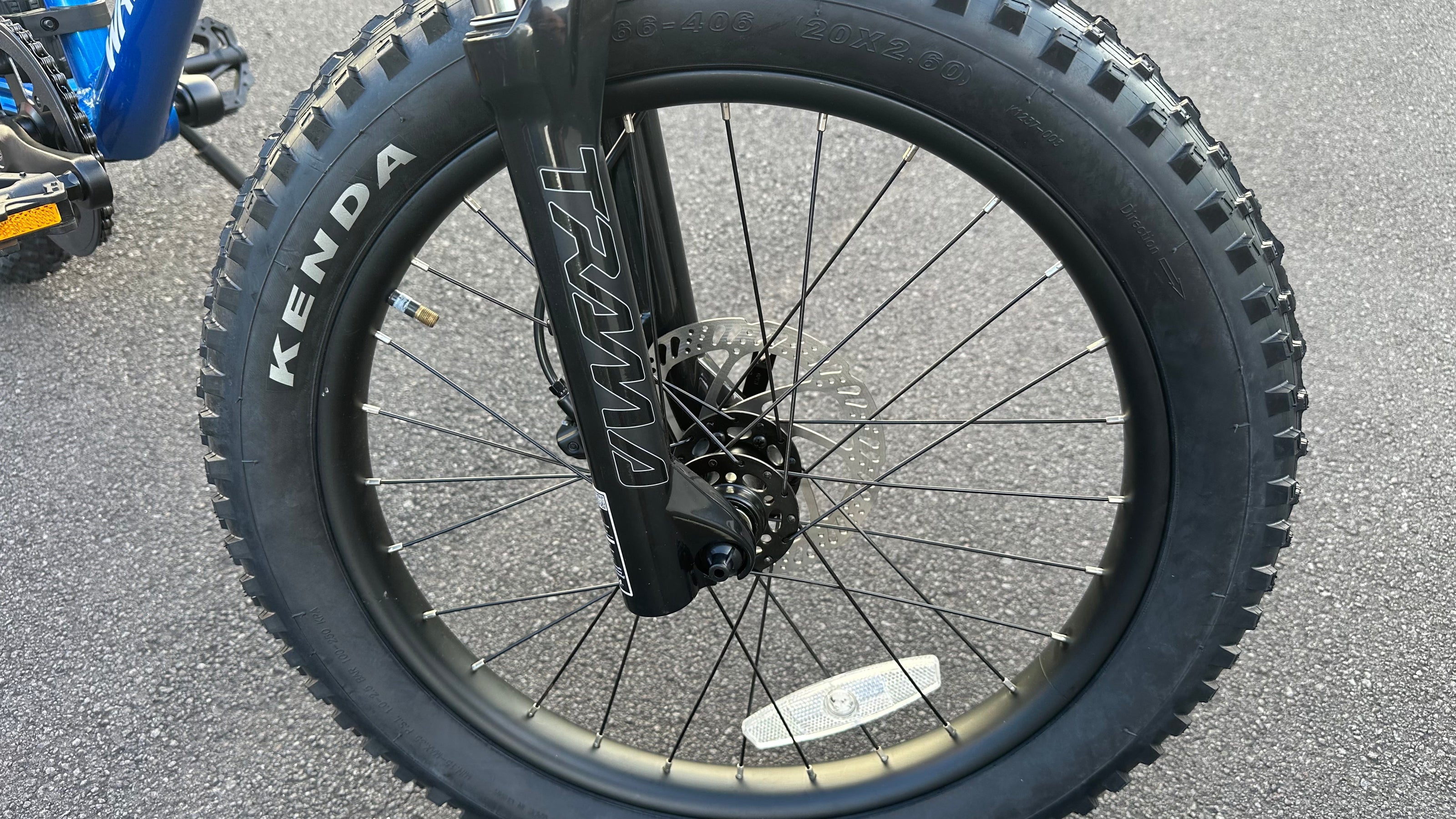 AB Bikes Kids Bikes 20inch Wrap Mountain bike in blue – front wheel view