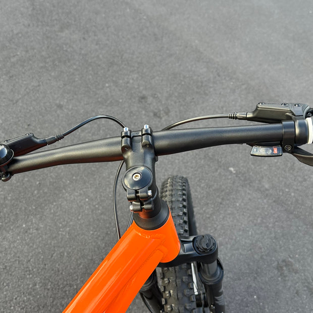 AB Bikes Kids Bikes Wrap Mountain bike in orange – handbar view