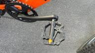 AB Bikes Kids Bikes Wrap Mountain bike in orange – foot pedal view