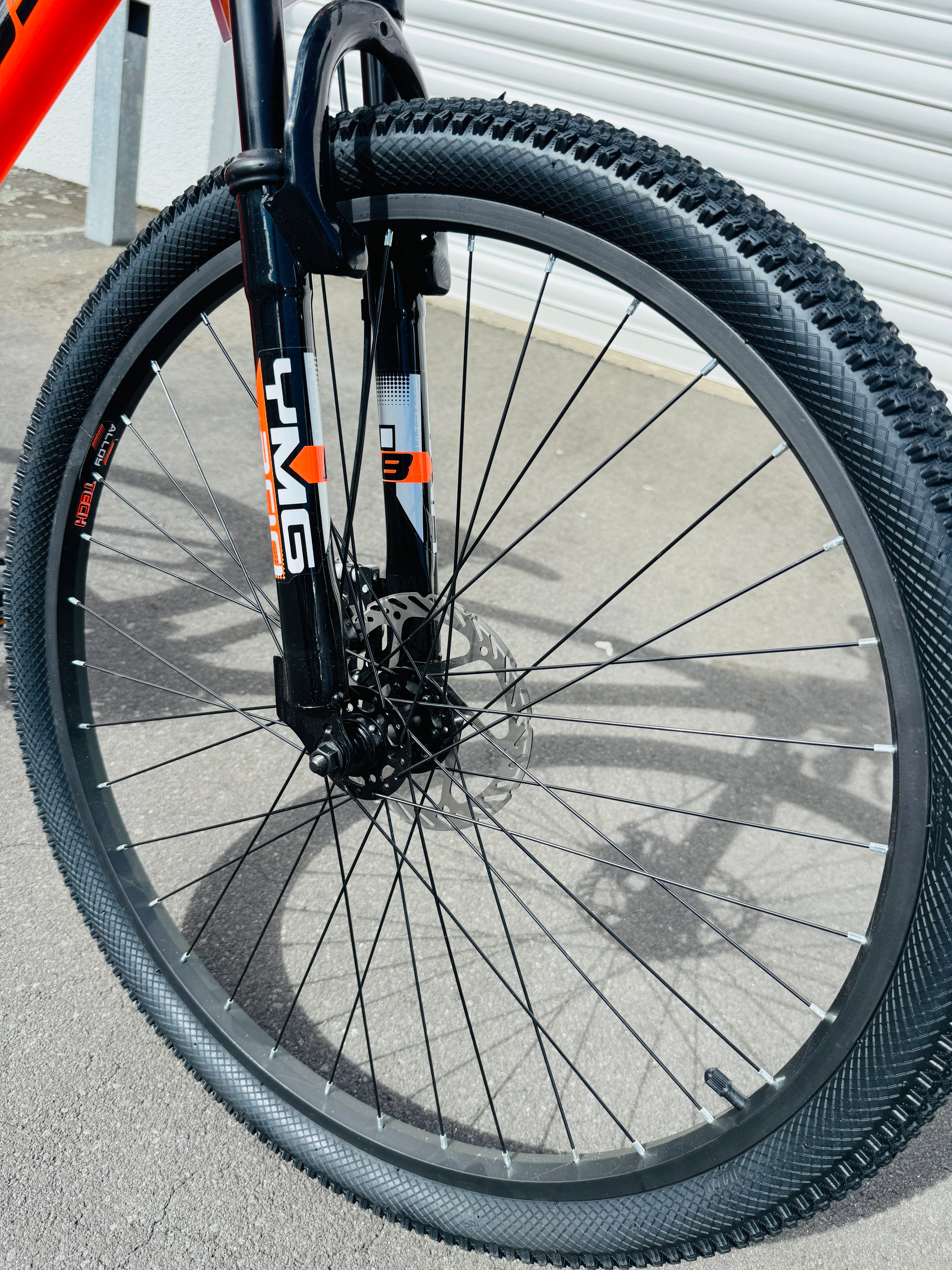 AB Bikes Mountain Bike Brabus Ironhill in orange – front wheel view