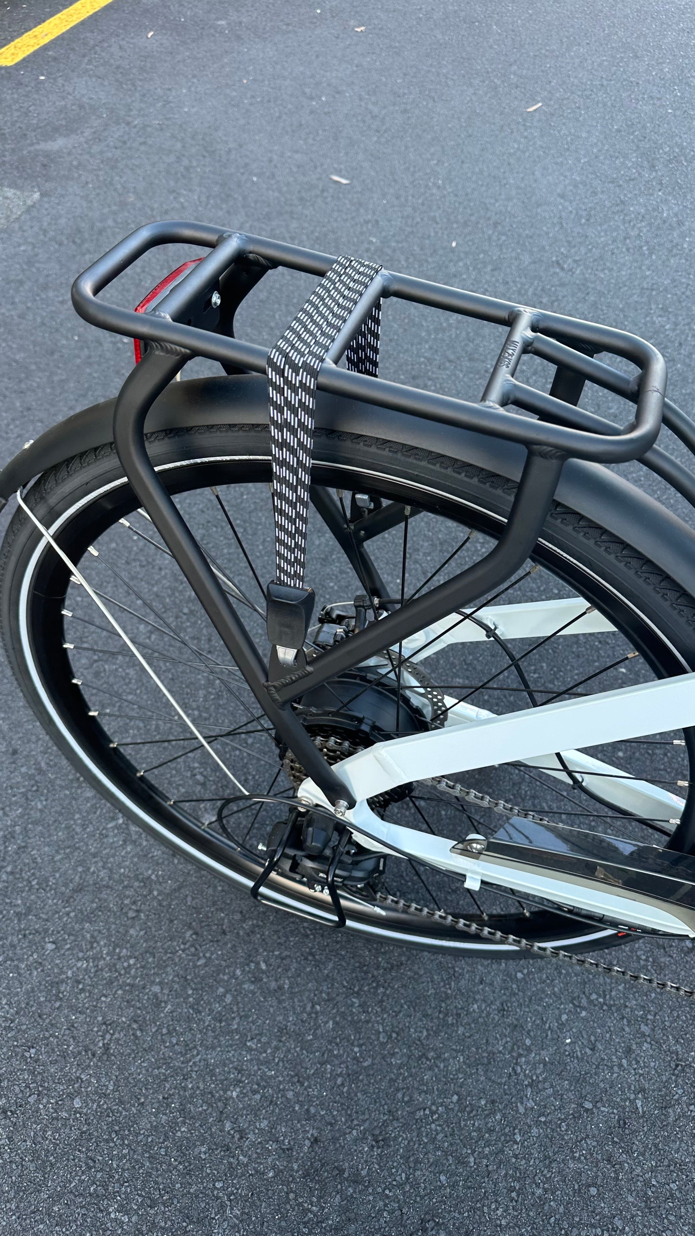 AB Bikes City Electric Assist Bicycle in white – rear wheel view