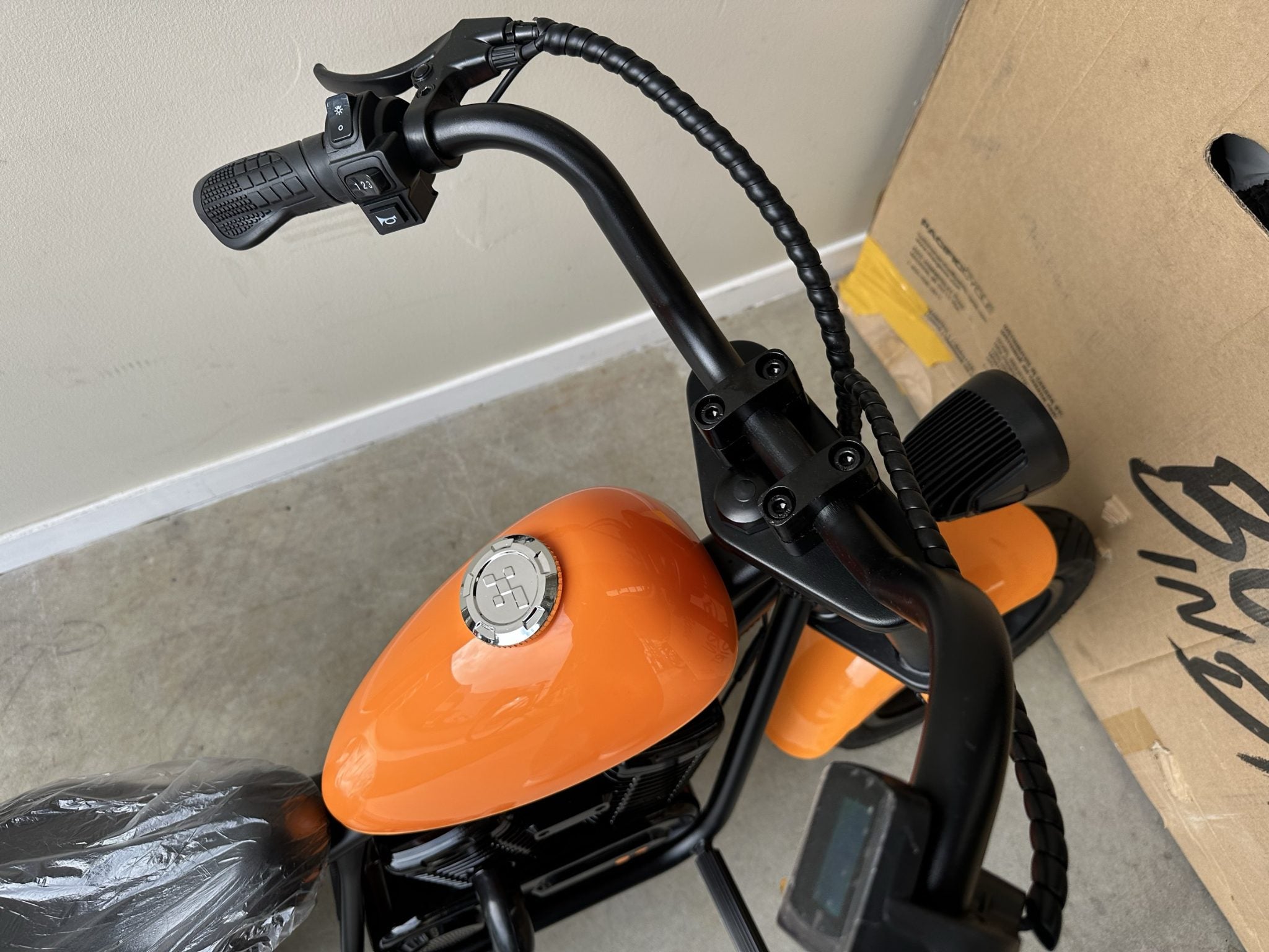 AB Bikes Kid Bike Electric Kids Bike in orange – top view