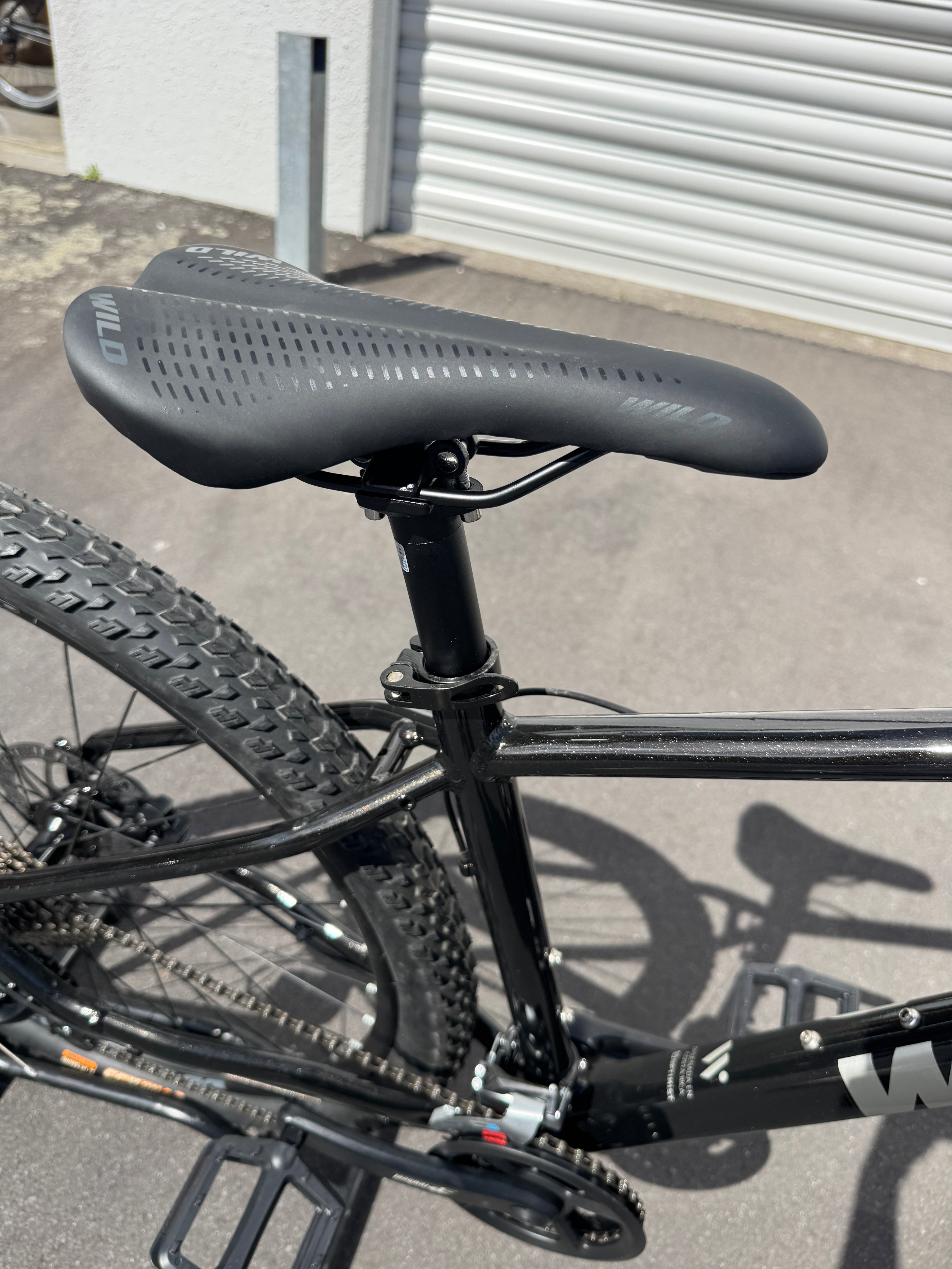 AB Bikes Mountain Bikes Kapoli Wild in black – bike seat view