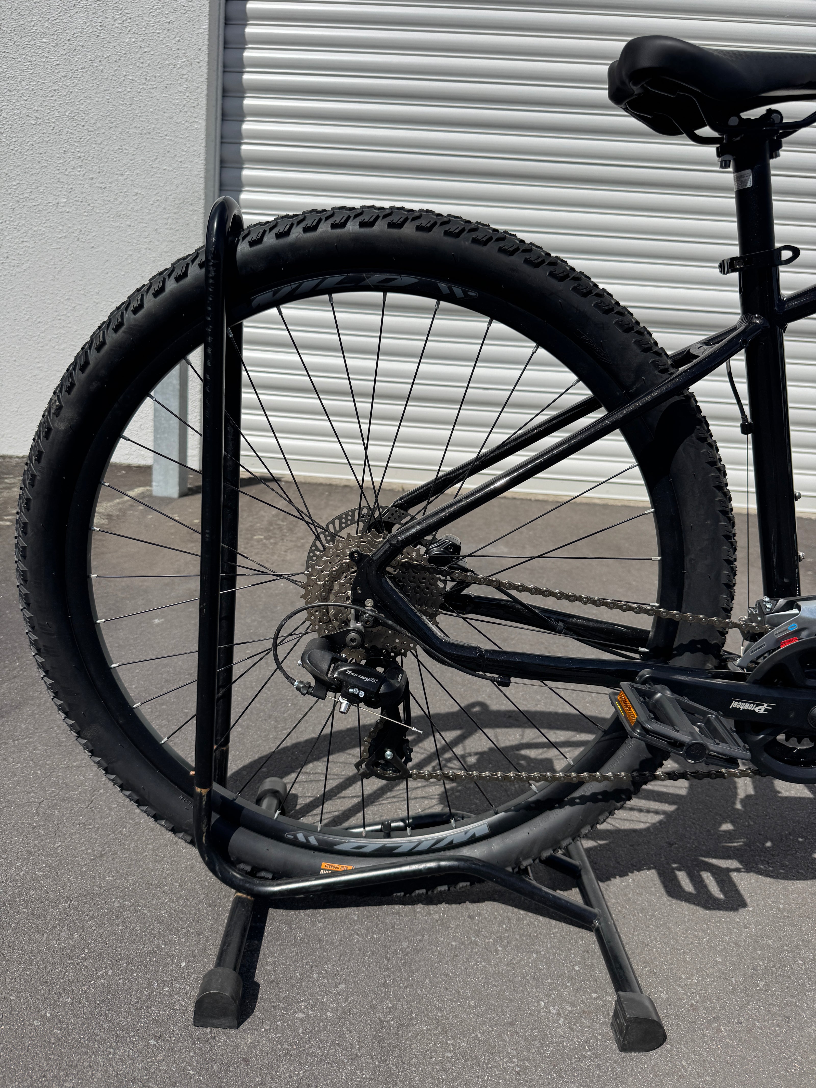 AB Bikes Mountain Bikes Kapoli Wild in black – rear wheel view