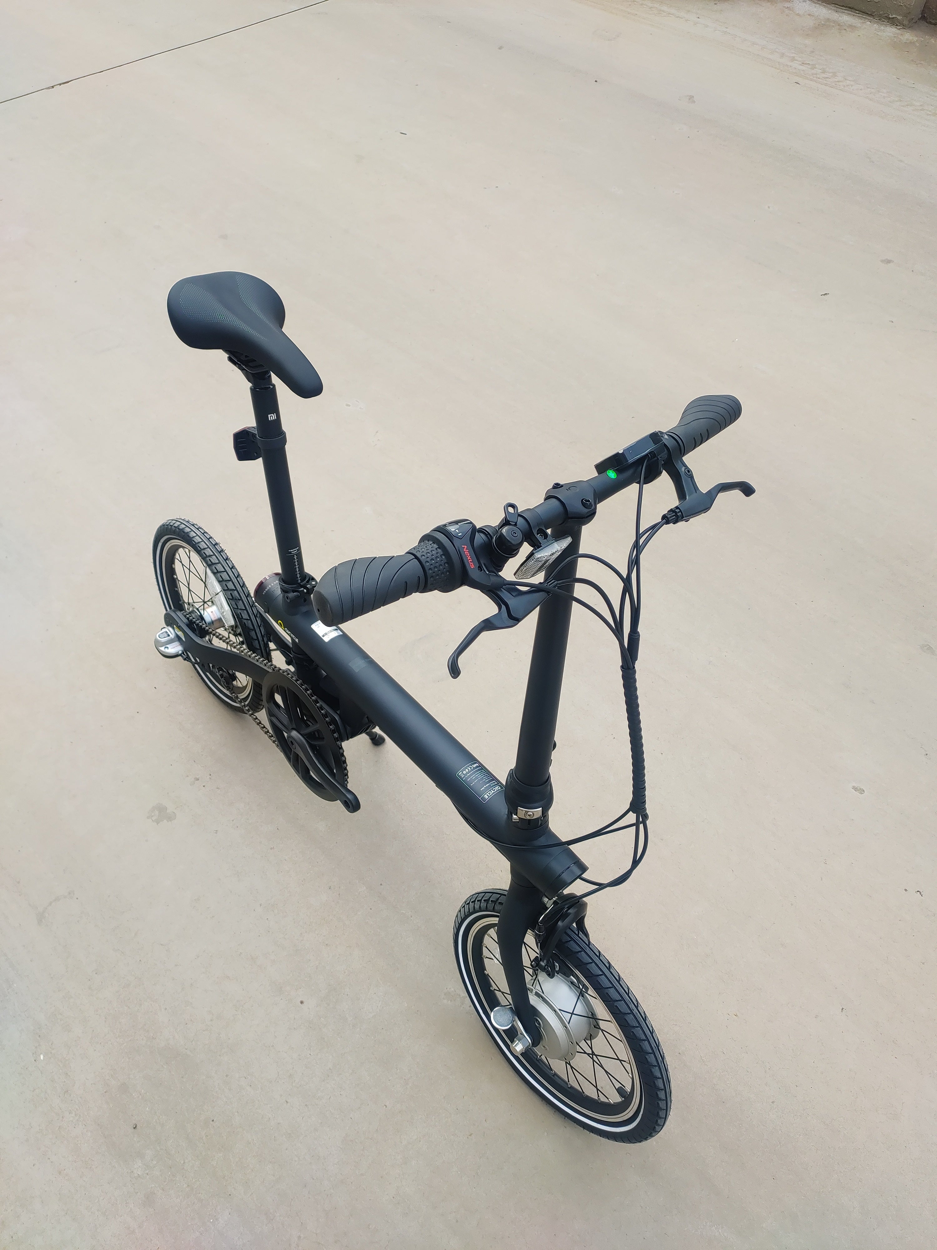 AB Bikes Electric Assist Bike Mi Qi in black – top side view