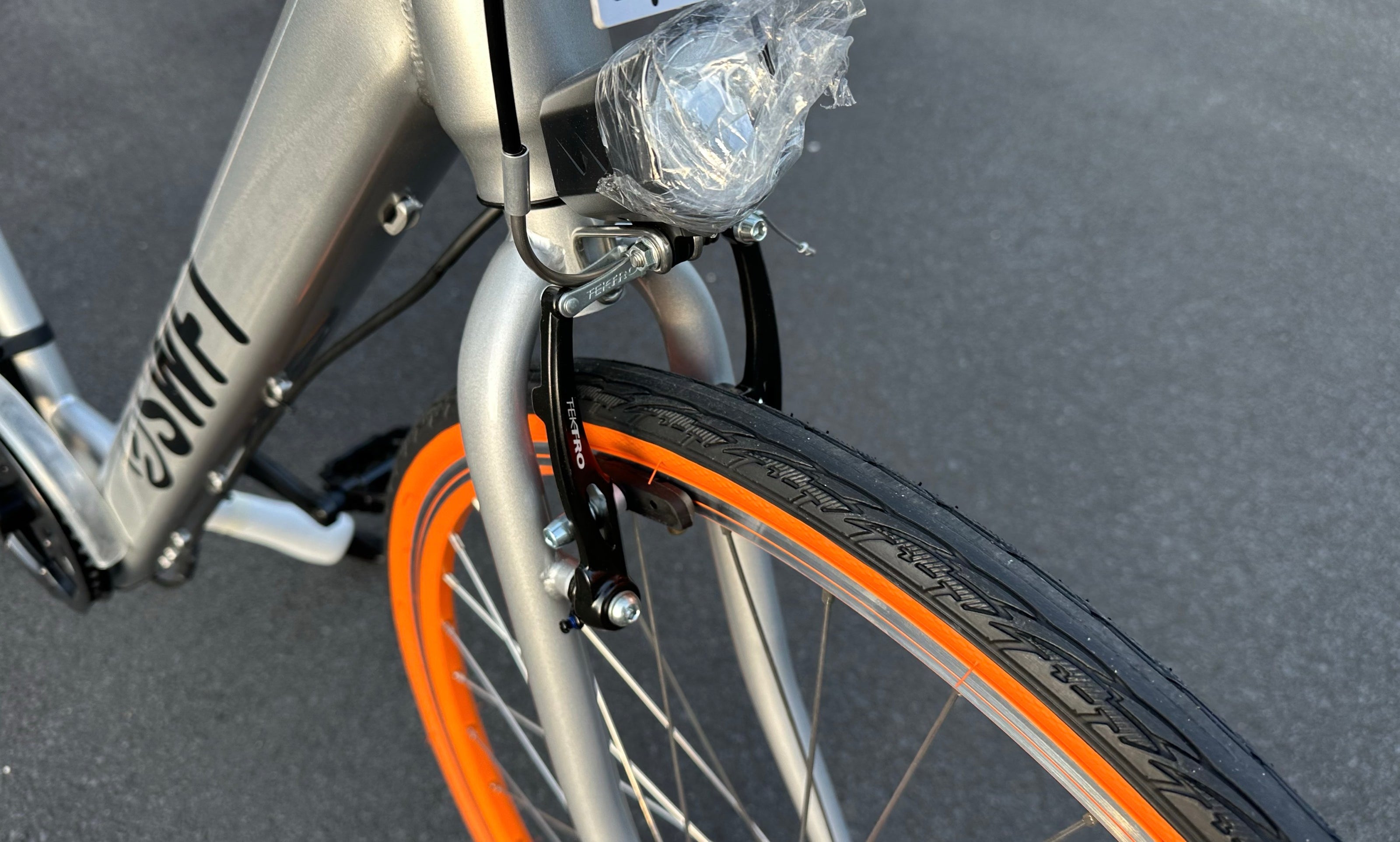 AB Bikes Electric Assist Bike SWFT VOLT in silver – bike light view