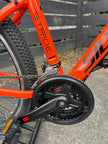 AB Bikes Mountain Bike Silverback Stride in orange – foot pedal view