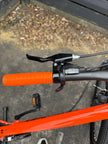 AB Bikes Mountain Bike Silverback Stride in orange – left handbar view