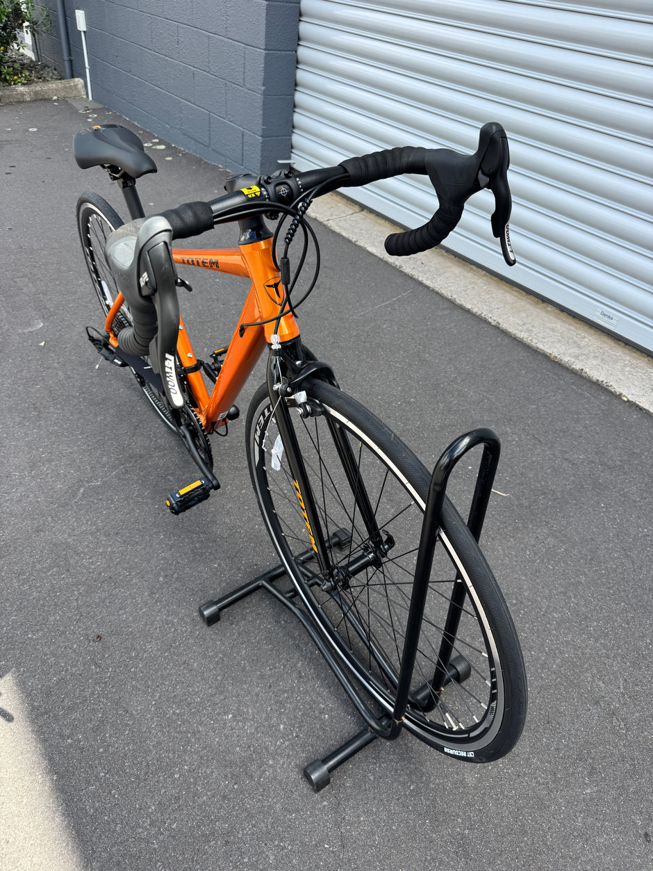 AB Bikes Road Bike Totem in orange – front side view